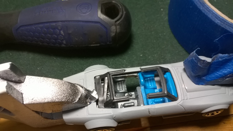 I flipped this over and glued the interior together. Taking advantage of the fact that the base was missing right where I was gluing